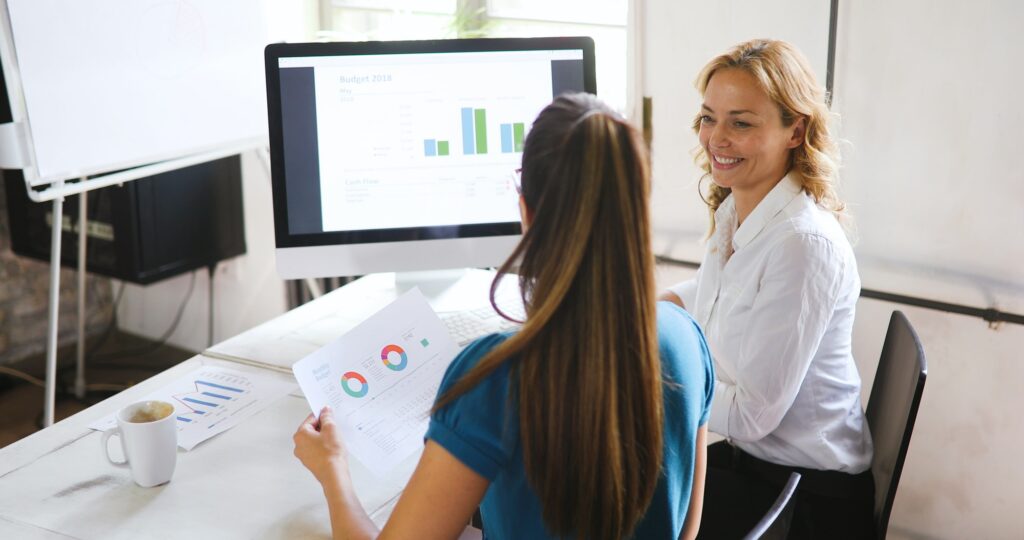 Collaboration and analysis by business people working in office